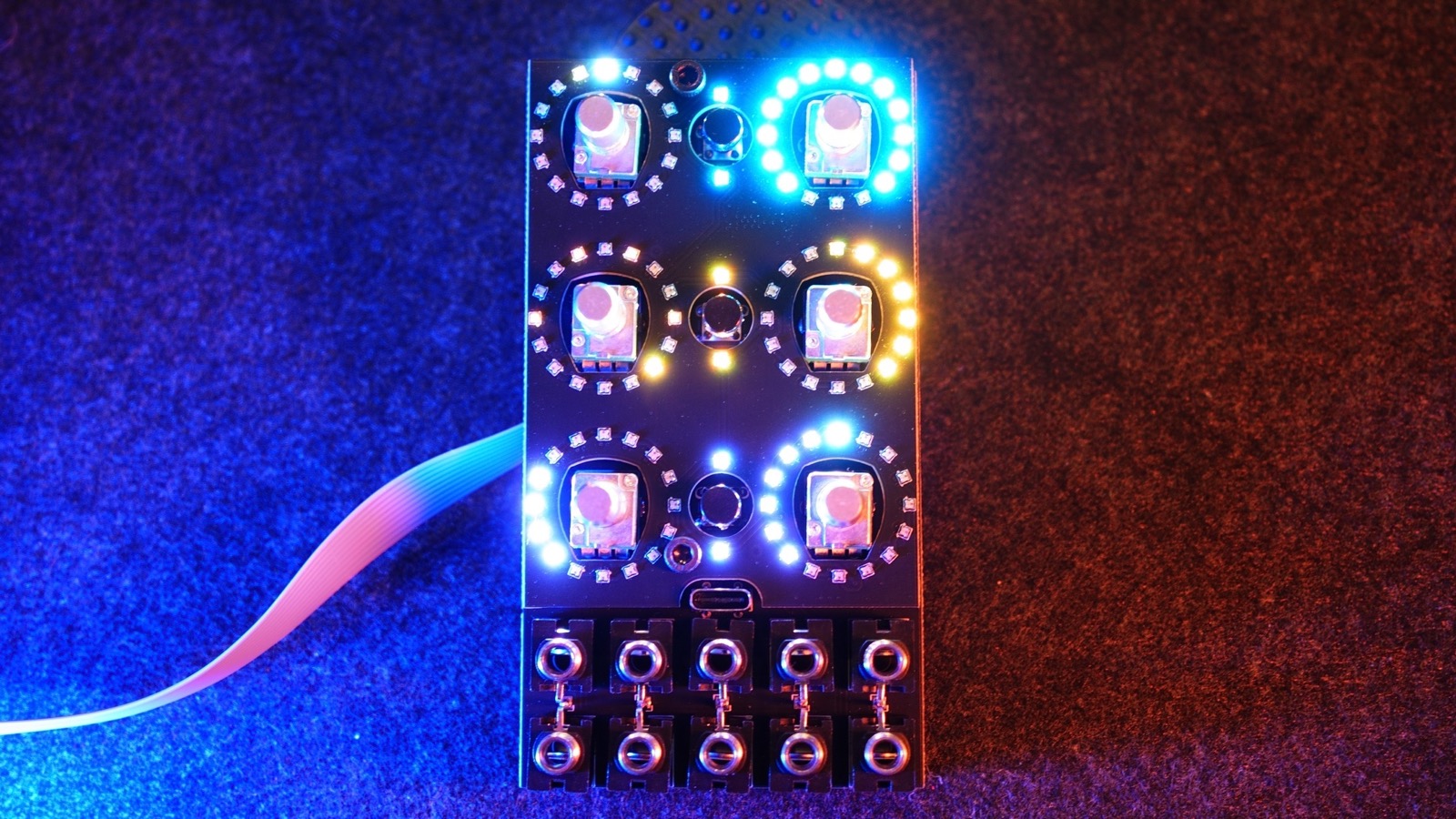 Bare Alchemy Lab circuit board running without a faceplate, showing pots, buttons, jacks, and RGB LED rings